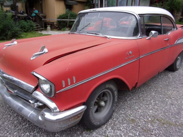 1957 red Chevrolet Bel Air/150/210 2 door ht