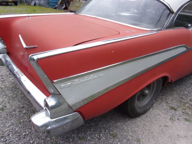 1957 red Chevrolet Bel Air/150/210 2 door ht