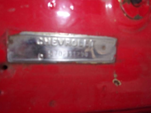 1957 red Chevrolet Bel Air/150/210 2 door ht