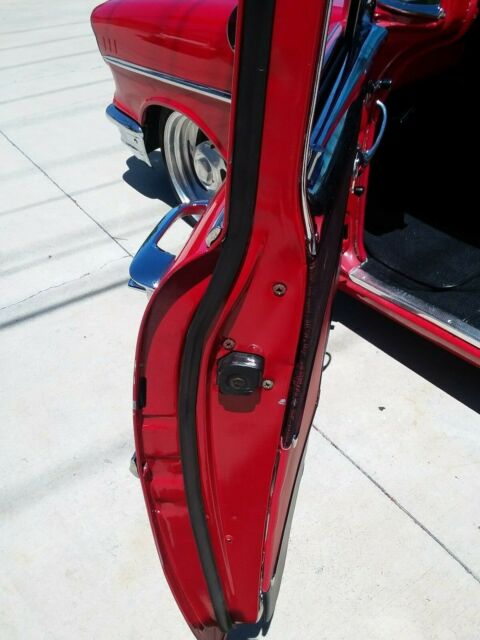 1957 Red Chevrolet Bel Air/150/210 Coupe