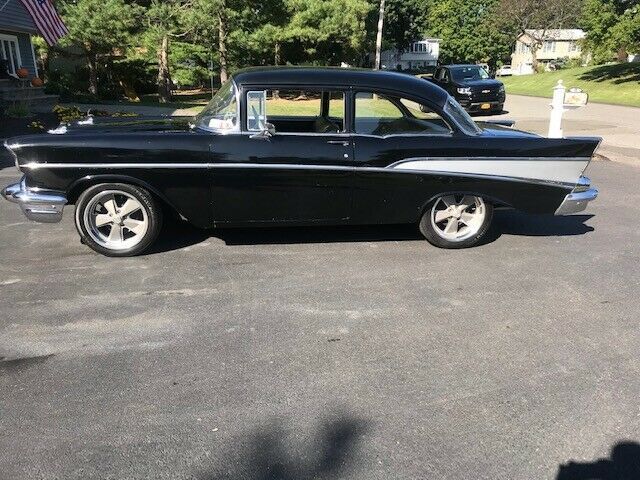 1957 black Chevrolet Bel Air/150/210 Sedan