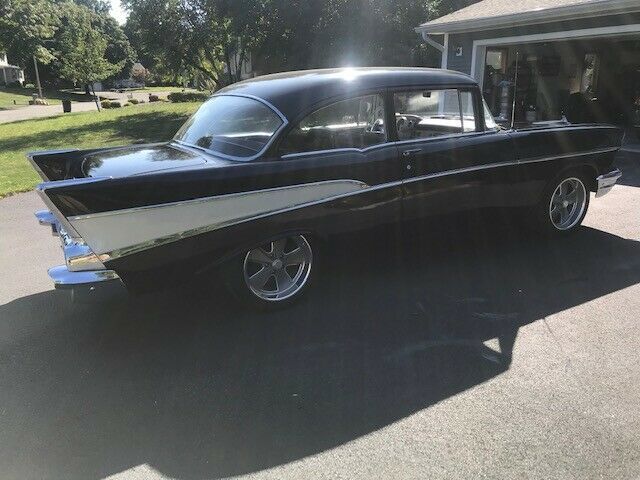 1957 black Chevrolet Bel Air/150/210 Sedan