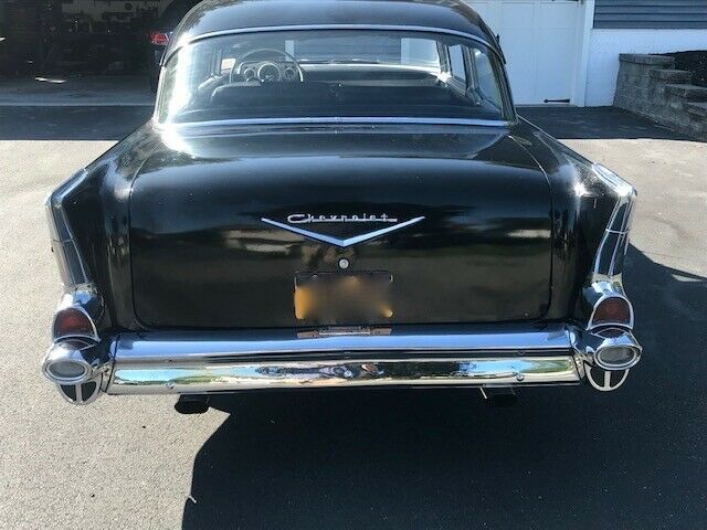 1957 black Chevrolet Bel Air/150/210 Sedan