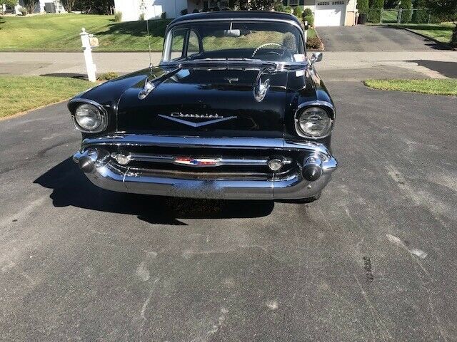 1957 black Chevrolet Bel Air/150/210 Sedan