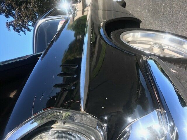 1957 black Chevrolet Bel Air/150/210 Sedan