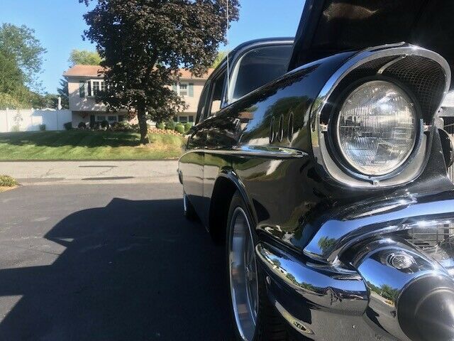 1957 black Chevrolet Bel Air/150/210 Sedan