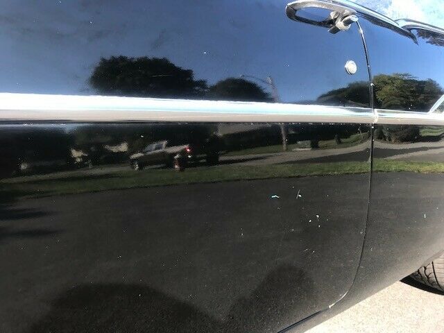 1957 black Chevrolet Bel Air/150/210 Sedan