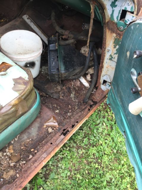 1957 blue & white Chevrolet Bel Air/150/210 Sedan 4 door