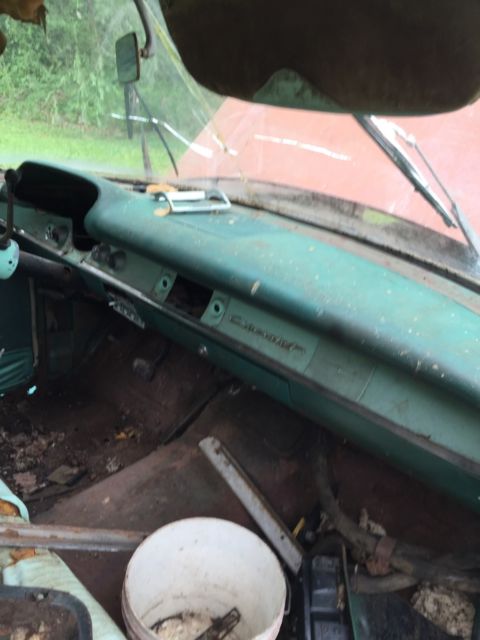 1957 blue & white Chevrolet Bel Air/150/210 Sedan 4 door