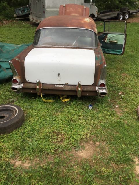 1957 blue & white Chevrolet Bel Air/150/210 Sedan 4 door