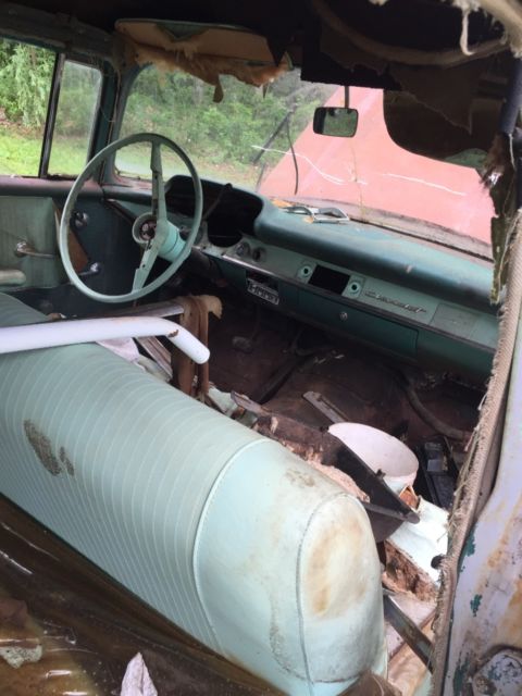 1957 blue & white Chevrolet Bel Air/150/210 Sedan 4 door