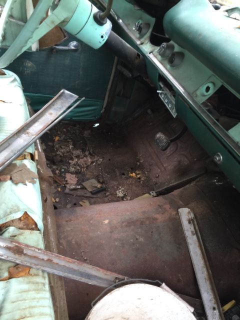 1957 blue & white Chevrolet Bel Air/150/210 Sedan 4 door