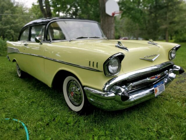 1957 Yellow Chevrolet Bel Air/150/210 Sedan