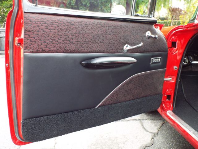 1957 Red Chevrolet Bel Air/150/210 Sedan