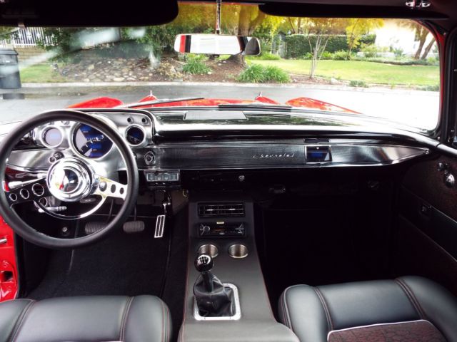 1957 Red Chevrolet Bel Air/150/210 Sedan