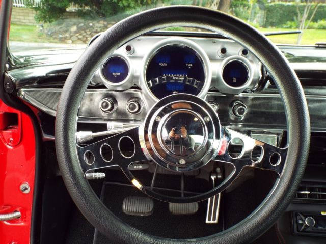 1957 Red Chevrolet Bel Air/150/210 Sedan