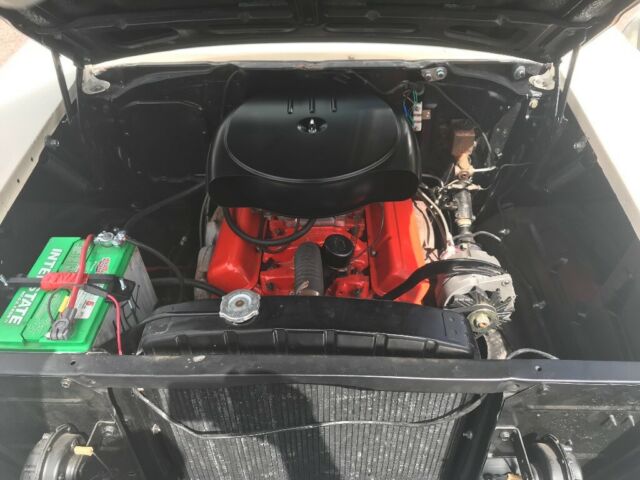 1957 White Chevrolet Bel Air/150/210 Sedan