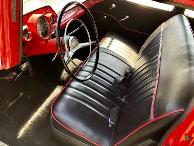 1957 Red Chevrolet Bel Air/150/210 Sedan