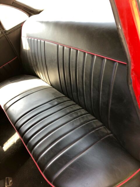 1957 Red Chevrolet Bel Air/150/210 Sedan