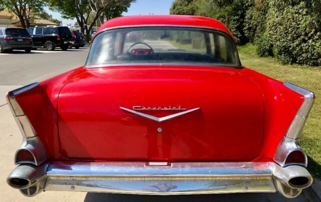 1957 Red Chevrolet Bel Air/150/210 Sedan