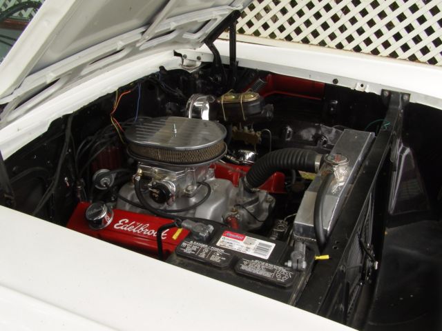 1957 white/red Chevrolet Bel Air/150/210 Sedan