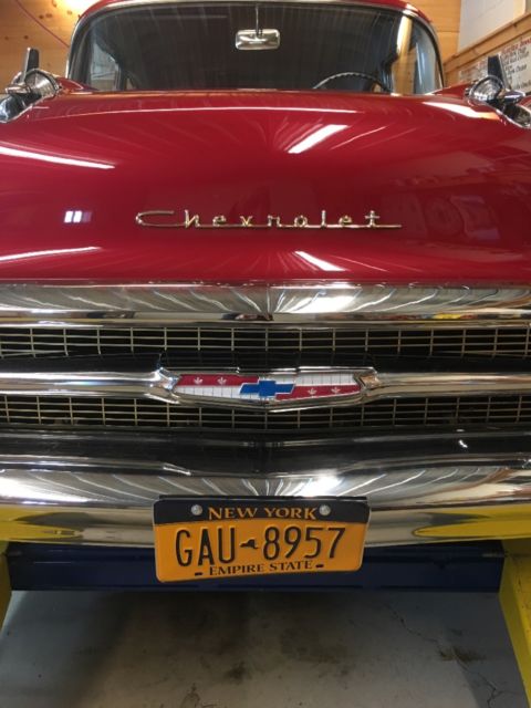 1957 Red Chevrolet Bel Air/150/210 Coupe