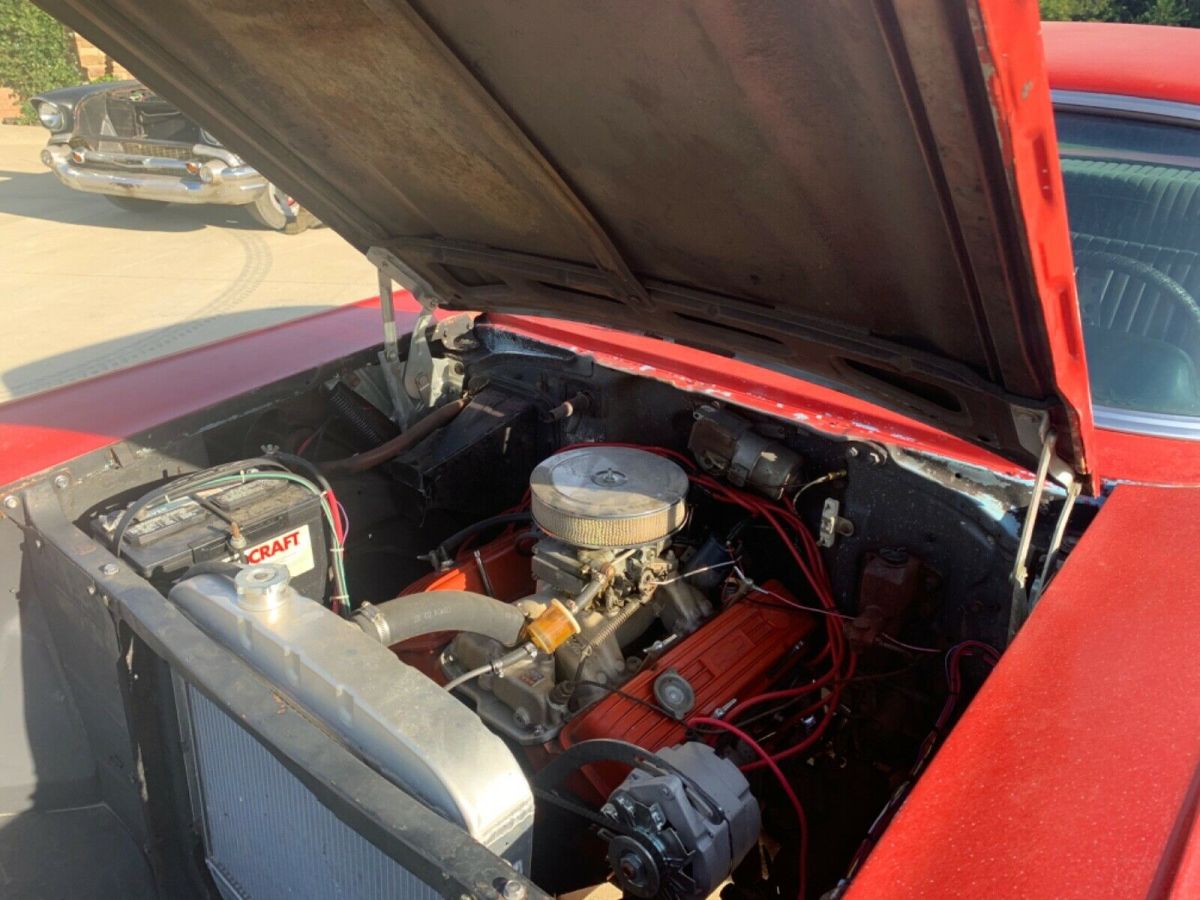 1957 Red Chevrolet Bel Air/150/210 Sedan