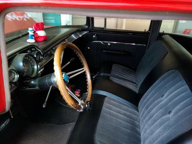 1957 Red Chevrolet Bel Air/150/210 Sedan