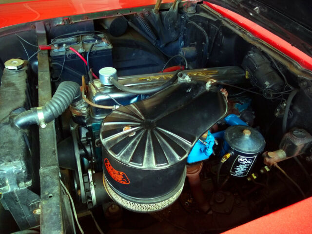 1957 Red Chevrolet Bel Air/150/210 Sedan