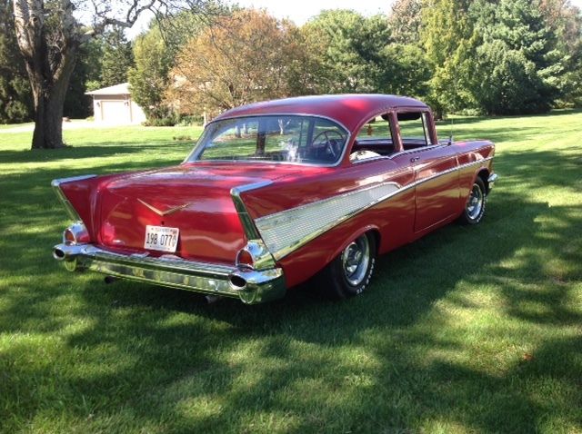 1957 red Chevrolet Bel Air/150/210