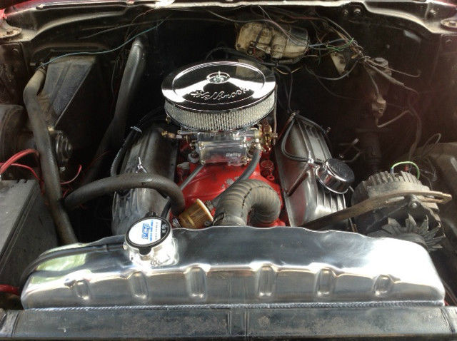 1957 red Chevrolet Bel Air/150/210