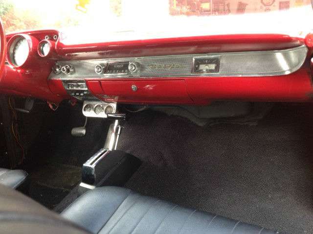 1957 red Chevrolet Bel Air/150/210