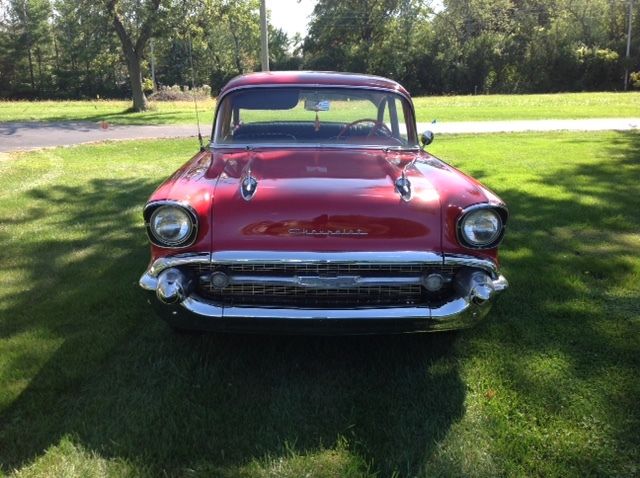 1957 red Chevrolet Bel Air/150/210