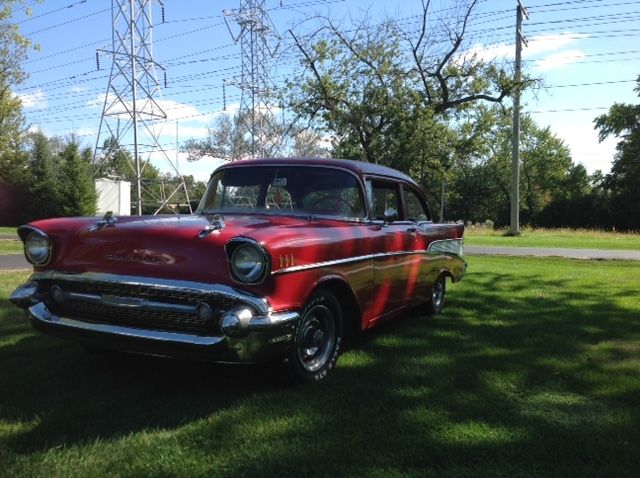 1957 red Chevrolet Bel Air/150/210