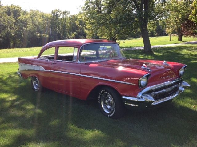 1957 red Chevrolet Bel Air/150/210