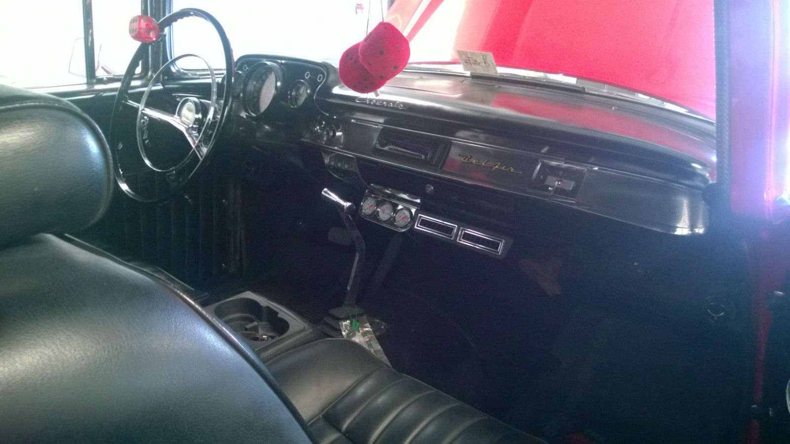 1957 Red Chevrolet Bel Air/150/210 Sedan