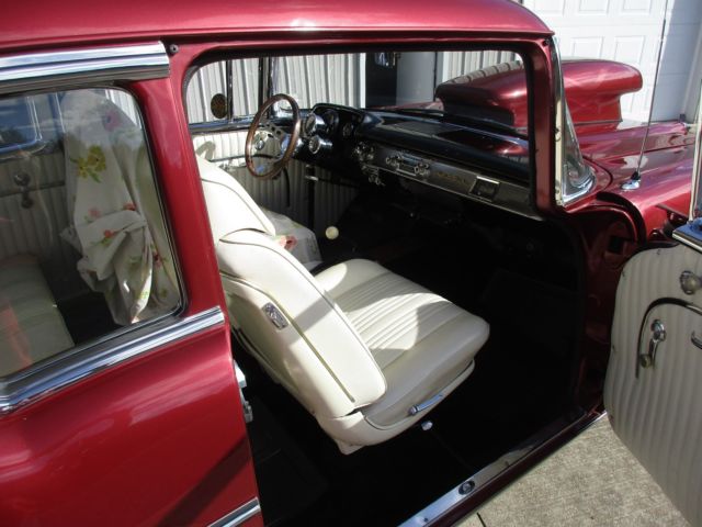 1957 RED MET. Chevrolet Bel Air/150/210 Sedan