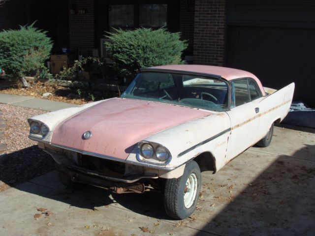 1957 Yellow Chrysler Saratoga Coupe