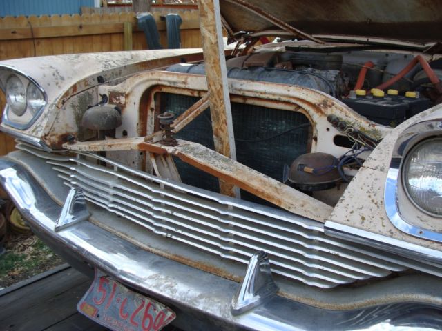 1957 Yellow Chrysler Saratoga Coupe