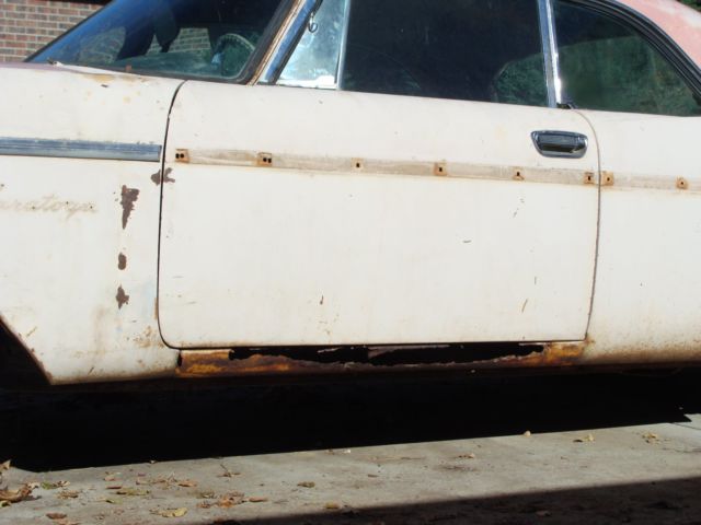 1957 Yellow Chrysler Saratoga Coupe