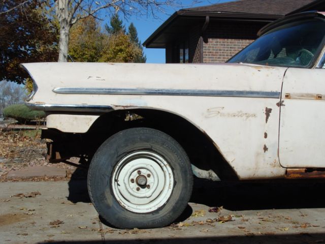 1957 Yellow Chrysler Saratoga Coupe