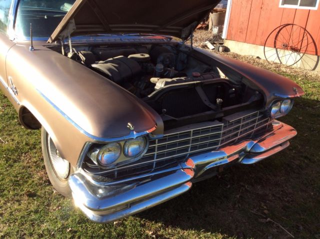 1957 Tan Chrysler Imperial Coupe