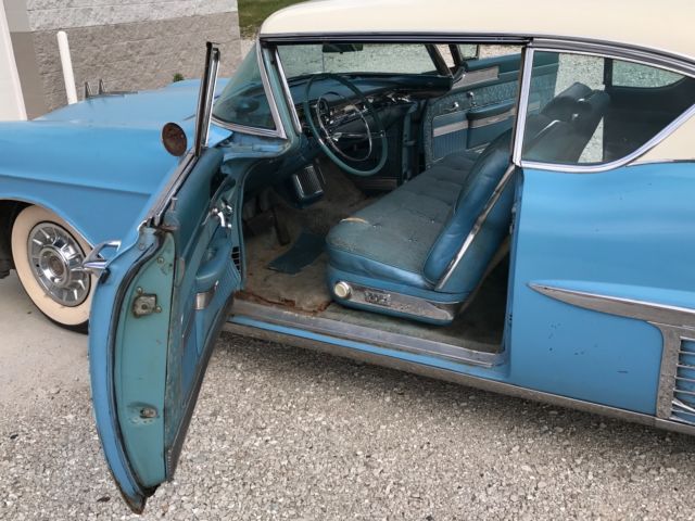 1957 Blue Cadillac DeVille Coupe