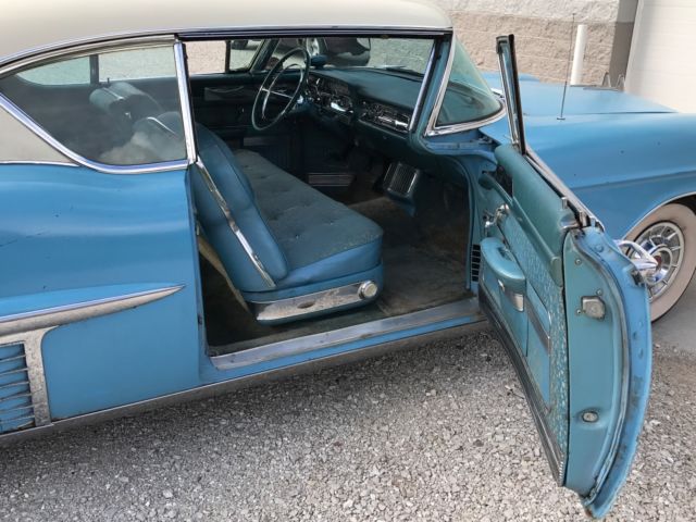 1957 Blue Cadillac DeVille Coupe