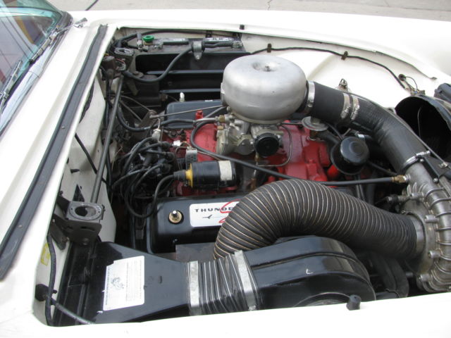 1957 White Ford Thunderbird 2 DR CONVT.