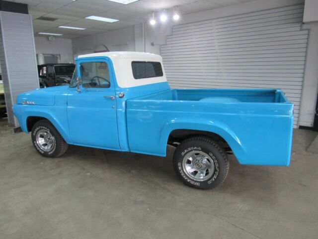 1957 Blue Ford F-100 --