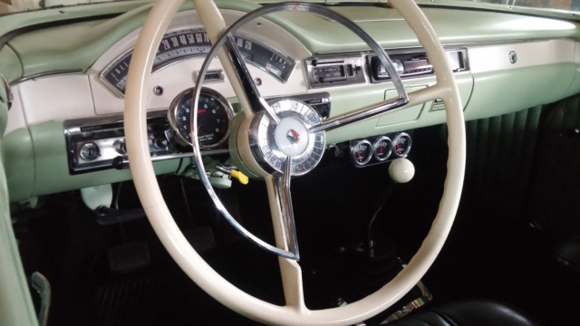 1957 green/white Ford Fairlane Coupe