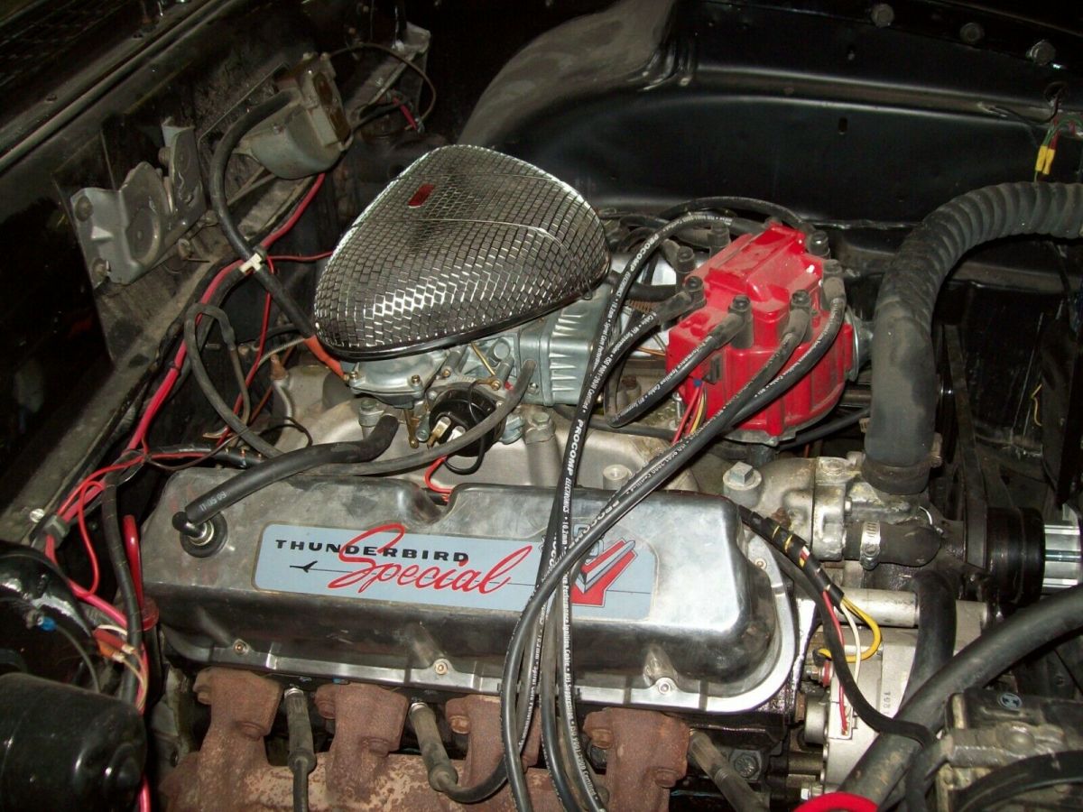 1957 Black Ford Fairlane retractable