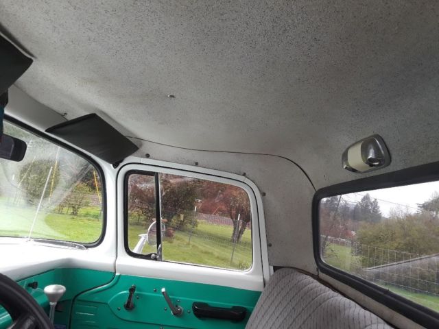 1957 Green and white Ford F-100 Short wide box