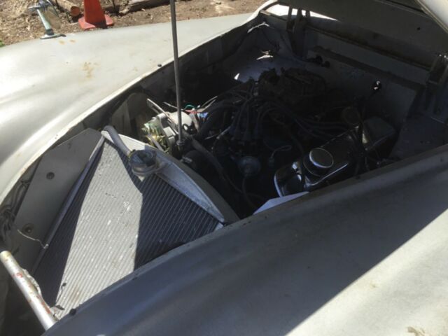 1957 Gray Jaguar XK Coupe